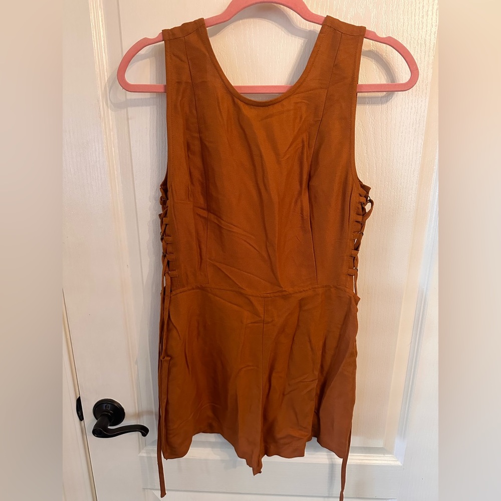 Small RVCA tie side romper. Never worn